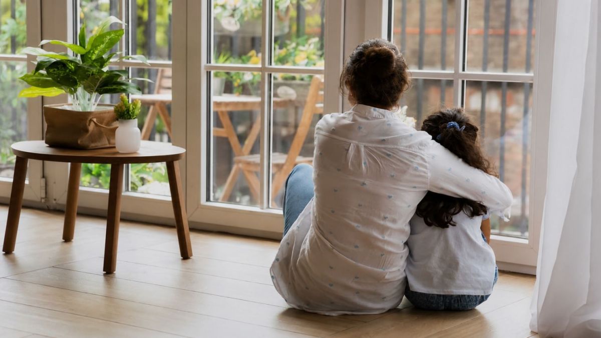 A family at home in a Krishe residence